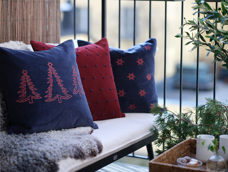 Dark brown and taupe designer cushions in a elegant living room setting